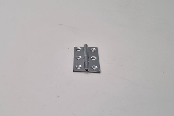 Metallic hinge on a plain white background