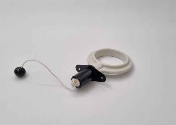 White and black pacifier on a light gray background
