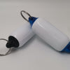 Two white and blue keychain fobs with metal rings on a light gray background