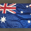 Waving Australian flag on a gray surface