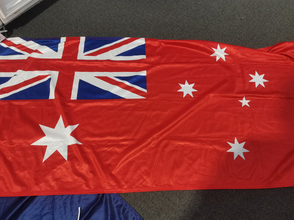 Australian flag with Union Jack design on a dark surface