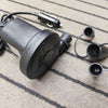 air pump with a cable on a textured carpet
