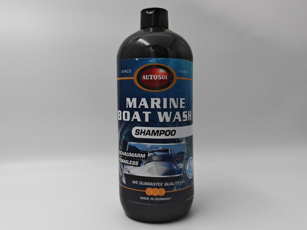 Bottle of Marine Boat Wash Shampoo with visible label on a gray background
