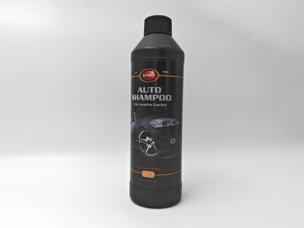 Car shampoo bottle labeled 'Auto Shampoo' on a white background