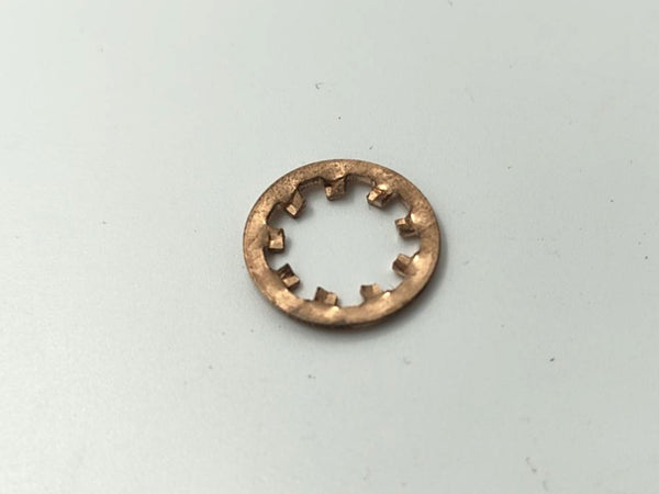 Bronze washer on a light gray background