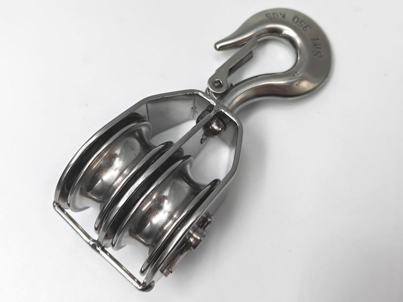 A stainless steel single-pulley block with a hook, shown on a plain white background.