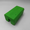A bright green 3D-printed rectangular block with a curved cutout on one end, featuring the embossed brand name 'PANTHER' on top, set against a neutral gray background.