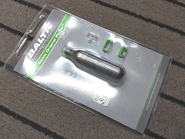 Baltic Original PnP CO2 cartridge in its clear blister packaging, displayed on a gray textured surface.