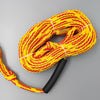 Yellow and red rope with a black handle on a gray background