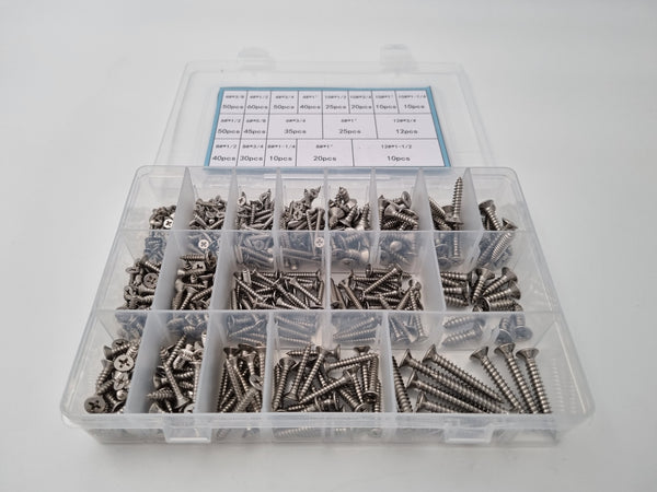 Front on photo of screws in a alightbox inside a box with seperate compartments 
18 different size screws