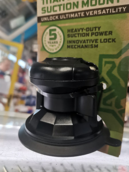 Black suction mount with branding and text on a blurred background