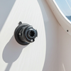 Close-up of a suction grip base with a clear sky background