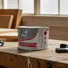 Altex multipurpose paint can on a wooden workbench with tools in a workshop setting