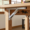 Wooden workbench with tools in a workshop setting