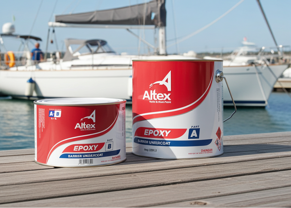 Two cans of Altex Epoxy paint on a dock with boats in the background