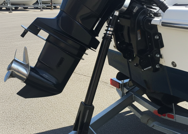 Outboard motor on a trailer with a marina background
