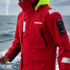 Person wearing a red and yellow jacket on a boat with stormy weather and lightning in the background