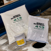 West System 413 microfibre blend bags and container on a workbench.