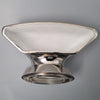 Metallic vent scoop fixture on a gray background