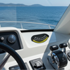 Boat dashboard with a view of the ocean and sky